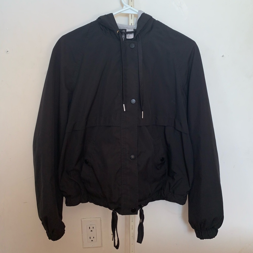 Black windbreaker